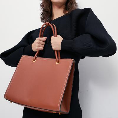 China Latest fasion handbags fashion women's shoulder handbags pu packing handbags man woman shopping bags custom logo for sale