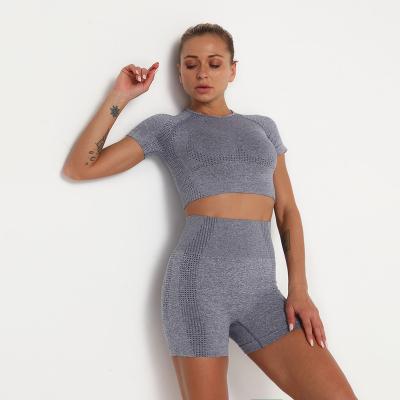 China Wholesale Breathable Workout Wear Suit 2 Piece Short Sleeve Vest Shorts Seamless Women Yoga Tights Gym Set Customize Uniform OEM Stock for sale