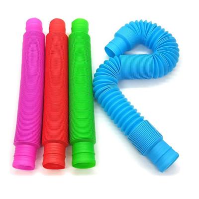 China More Fun For Kids Hot Sale DIY Fun Pull And Pop Tubes Wiggle Toys Plastic Hose Relaxing Toys for sale