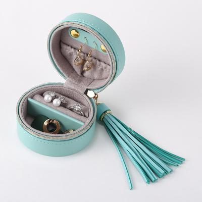 China Lady Leather Mini Cute Zipper Jewelry Organizer Mini Cute Jewelry Box Top Seller Portable Round Jewelry Box Earring Storage Box With Tassel for sale