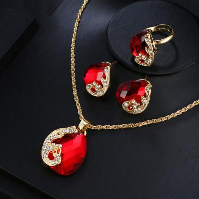 China FASHION Women Jewelry Set Red Zircon Water Drop Alloy Bracelet Earrings Necklace Jewelry Three Piece Set for sale