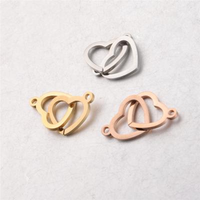 China Fashion Stainless Steel Hollow Heart Shape Stainless Steel Double Heart Connector Jewelry Accessories Wholesale for sale