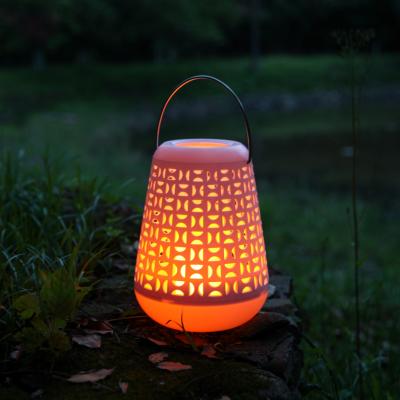 China Newish garden solar lights outdoor waterproof plastic lantern light with plastic flaming candle for sale