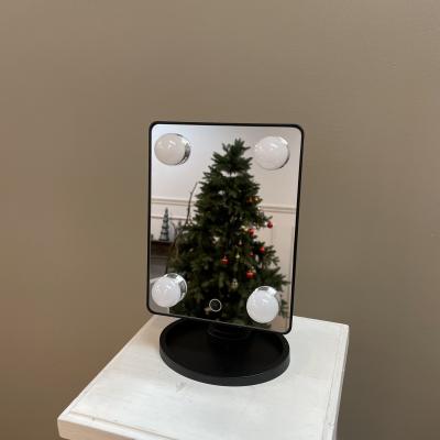 China The latest design style decorative cube mirror with led light 360 degree desktop makeup mirror with 4 bulbs for sale