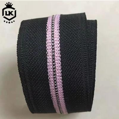 China Competitive custom new design special shape zipper with special zipper teeth and stripe zipper tape for sale