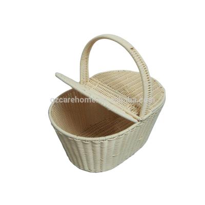 China High quality sustainable graceful handweaved plastic handle rattan hotel picnic basket for sale