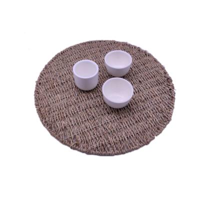 China Viable Elegant Handmade Weave Vietnam Table Mat Straw Round Dish Natural Vegetable Plankton Place Mats for sale