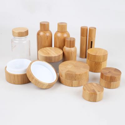 China frascos 35ml de empacotamento cosméticos recarregávéis de 47mm com tampas de bambu 28/400 à venda