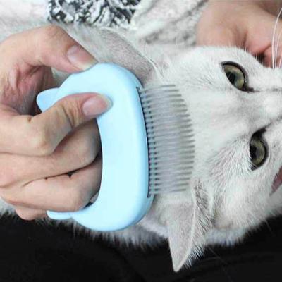 China Cat Grooming Massage Brush Stocked with Shell Shaped Handle Hair Remover Pet Grooming Massage Tool for sale