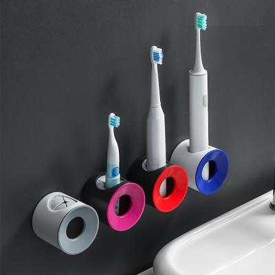 China Factory Direct Fashionable Round Shape Wall Mount Electric Toothbrush Holder Storage Viable for sale