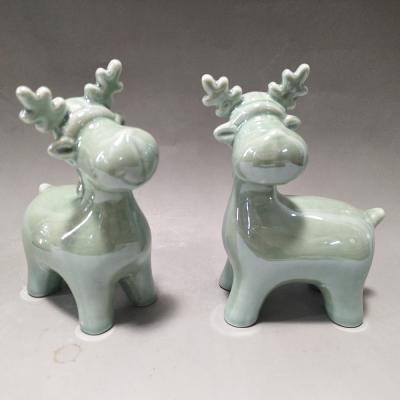 China European Hot Selling Design Custom Color Christmas Indoor Decoration Items Ceramic Reindeer Figurines for sale