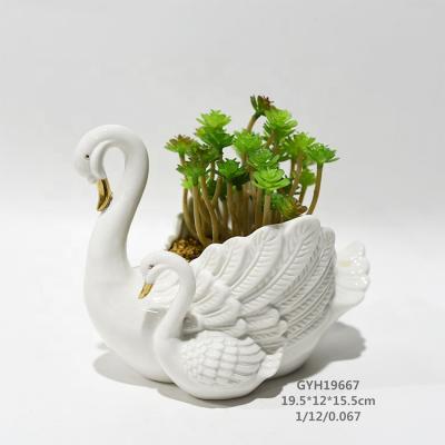 China Modern Art Decor Animal Design Swan Ceramic Planter For Sale for sale