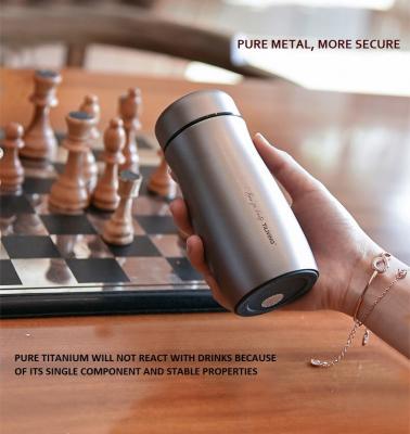 China Business 99.9% pure titanium fashionable double-layer mini water cup thermos cup women portable without paint for sale