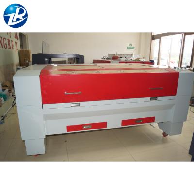 China Laser CUTTING 130W laser cutting machine SHZR-LCL plexiglass 3015 clothing laser cutting machine 1490 for sale