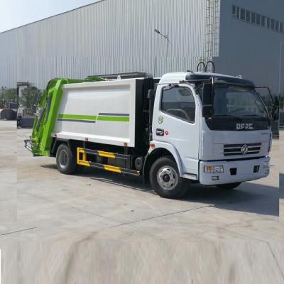 China Factory Dongfeng dump garbage truck compression docking refuse collector cars. for sale