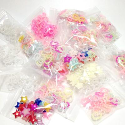 China ZQX138 Easy Hollow Star Heart Colorful Plastic Mud Bead Hair DIY Accessories for sale