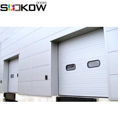 China industrial sectional industrial door/large factory industrial door/vertical lift sliding sectional doors for sale