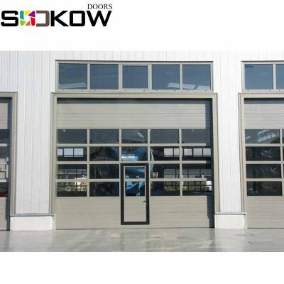 China Industrial Commercial Elevator Garage Glass Door With Small Door for sale