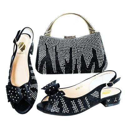 China Nueva moda negro zapatos de tacón y bolsos de juego zapatos italianos 2023 precio al por mayor moda con bolso para la boda en venta