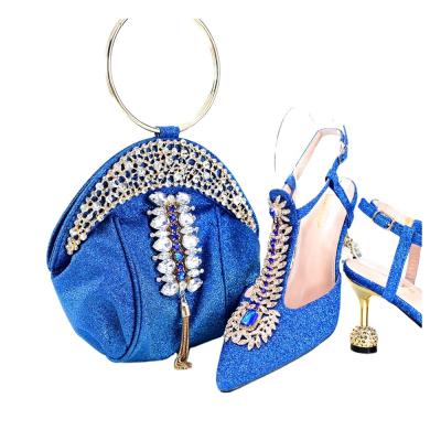 China 2023 Buena calidad africana Moda piedras brillantes negro zapatos de tacón alto y bolsos a juego zapatos italianos con bolso para la boda / parte en venta