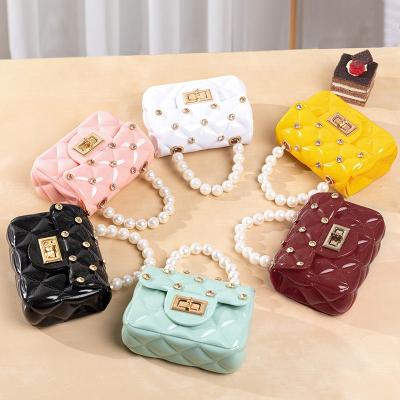 China 2021 New Fashion Design Suka Women Fashion Handbags Luxury Diamond Mini Jelly Purse Plaid Shoulder Purse Cassette Bag Women Saddle Bag for sale