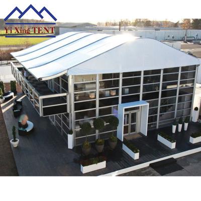 China High Quality Glass Wall Double Decker Tent Sports Event Rooftop VIP Arcum Tennis Padel Rolling Court For Big Sporting Event for sale