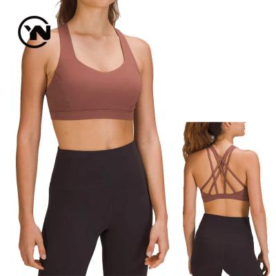 China Breathable Hot Fitness And Selling Yoga Wear Sporty Women Fitness Yoga Set Naked Tube Sports Gym 2 Piece Strap Bra Push Up Tops for sale