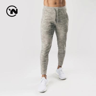 China Hot Selling Autumn Breathable Sports Gym Leggings Set Workout Fitness Jogging Leggings For Men for sale