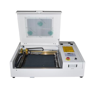 China Laser CUT 40W 50W 60W Mini Desktop 440 CO2 Laser Engraving Cutting Machine USB Supported for sale