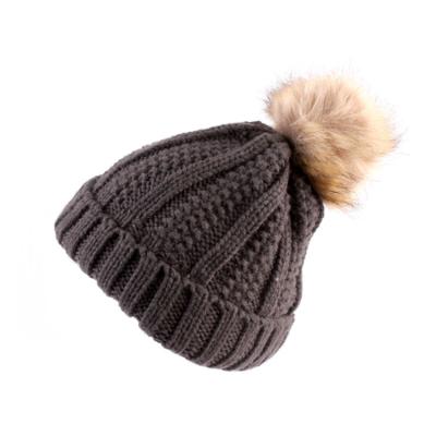 China JOINT factory new chunky winter knit pom pom women fur beanie soft hats for sale