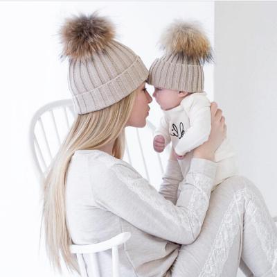 China COMMON MY Miyar Mom and Baby Hat with Pompom Faux Fur Beanie Kids Acrylic Knitted Parent-Child Hat Winter Warm Hats for sale