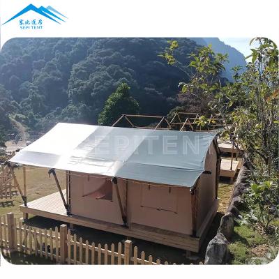 China Wooden safari tent luxury glamping tent waterproof canvas resort cottage for sale