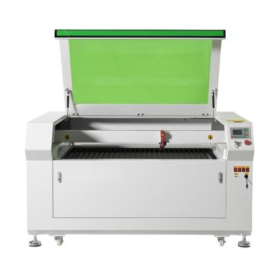 China Laser CUTTING small cnc co2 laser cutting machine for timberland / methacrylate / plexiglass boots for sale