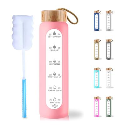 China 500ML Dishwasher Safe Borosilicate Glass BPA Free Water Bottle With Protective Silicone And Bamboo Sleeve Lid for sale