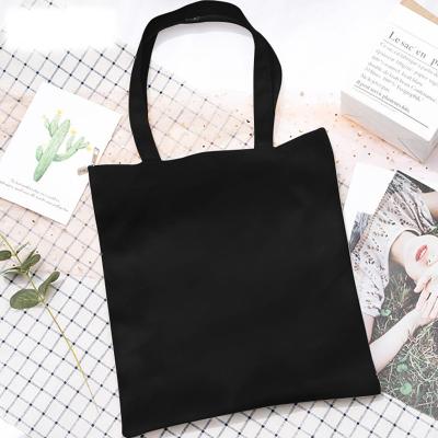 China Hot Selling Casual Solid Color Ladies Handbag Shoulder Bag Canvas Black White Bag Fashion Shopping Bag for sale