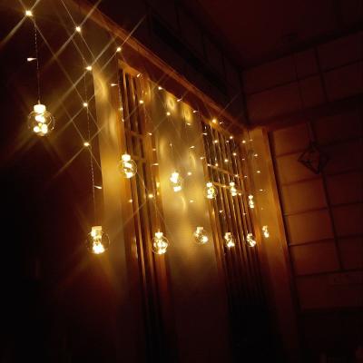 China Curtain Light 108 LED 12 Balls 8 Modes Indoor and Outdoor Battery Operated Ball Curtain String Flashing Lights for Window Decoration Wedding for sale