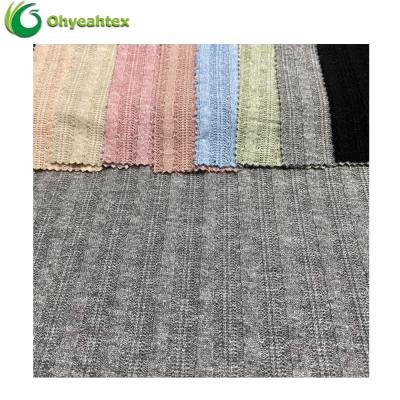 China Sustainable Custom Knit Nylon Rayon Polyester Blend Hacci Jacquard Fabric For Dress for sale