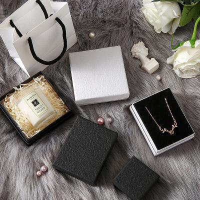 China Recycled Materials Low MOQ Free Samples Custom Logo Mini Personalized Jewelry Packaging Box Pouch and Box for sale