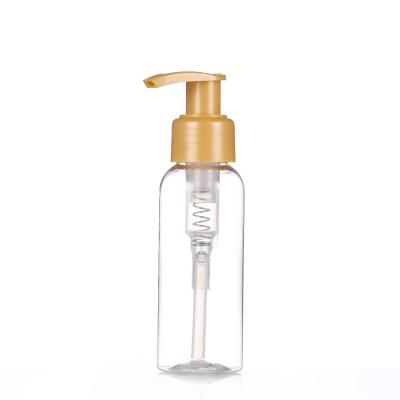 China Non Spill New Design Gold Color Empty Body Lotion Bottles With Pump for sale