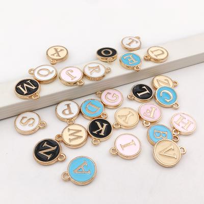 China Wholesale Fashion $5.9/set Champagne Enamel Initial Letters Charm Pendants For Jewelry DIY Handmade Design for sale