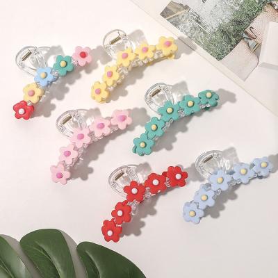 China Hair Decoration Fashion Ladies Hair Accessories New Flower Shape Plastic Claw Maintain Pure Color Lacquer Baking Claw Clips for sale