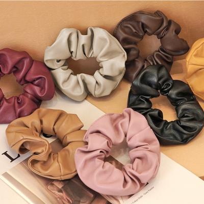 China Environmentally Friendly Wholesale Pure Color Hair Accessories PU Leatherette Female Elastic Hair Band for sale