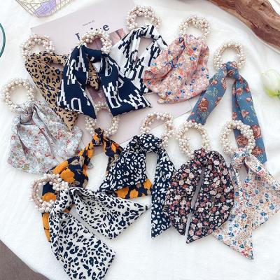 China European and American style fashion printed bow satin elastic hair band hair scrunchies elastic hair scrunchies women silk hair ties for sale