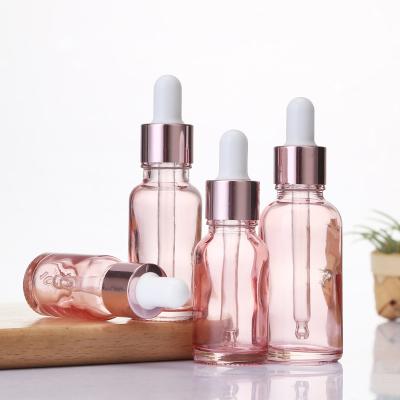 China 5ml ~100ml Personal Care Dropper Bottle Glass Essential Oil Essence Pink Bottles With Rose Gold Ring Logo Customization Printing for sale