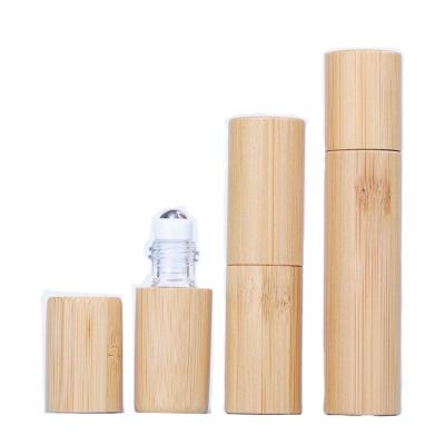 China 50pcs/lot 10ml Personal Care Cap Perfume Bottle Essential Oil Wooden Bottles Roll On Perfume Glass Roll On Bottles Stainless Steel for sale