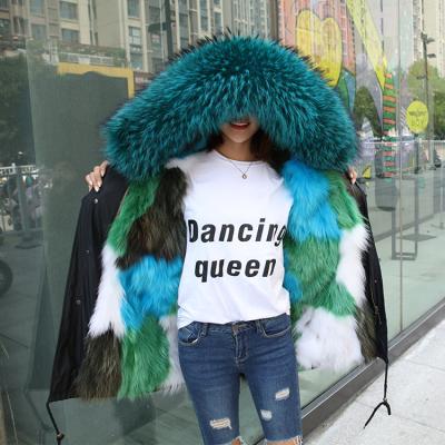 China New Design Luxury Natural Fur Coat Christmas Anti-Shrink Color With Big Sheepskin Hood Trimming Real Fur Parka for sale