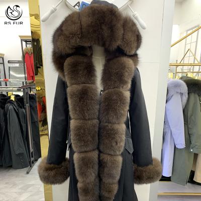 China Factory price anti-shrink fur lining overcoat hood style fox fur trimmed long parka with fox cuffs for sale