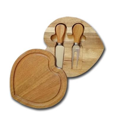 China Small Heart Shaped Acacia Wooden Cheese Board Sustainable Cheese Board With Knife Sets 2 Pcs Cheese Knife Sets With Boxes for sale