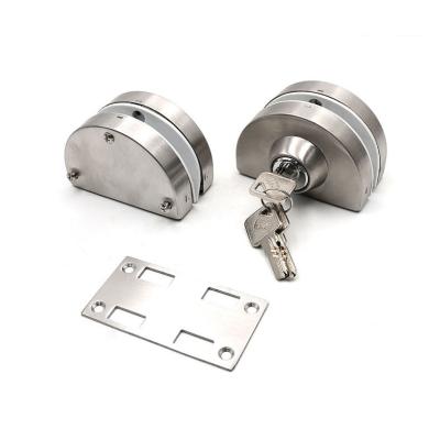 China Modern 304 Stainless Steel Switch Single Action Twisted Frameless Glass Door Lock No Glass Cutout for sale