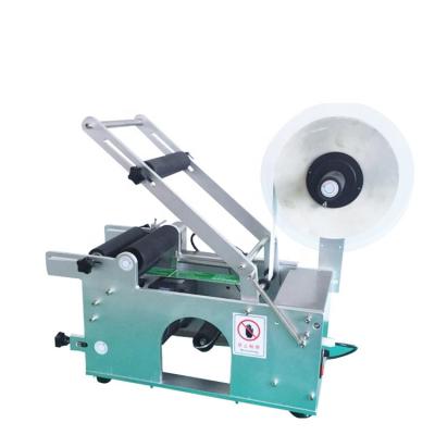 China Food Low Price High Performance Easy Operate Manual Labeling Machine for sale